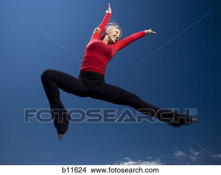 Picture - Woman jumping. Fotosearch