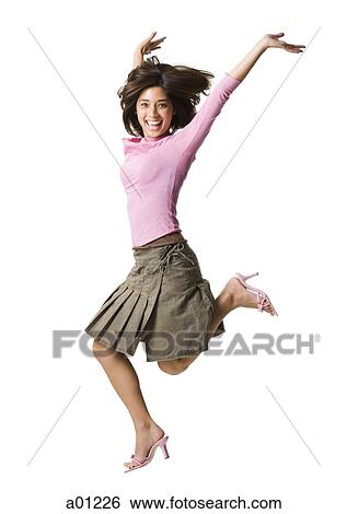 Stock Photograph - Woman jumping. Fotosearch