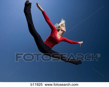 Woman jumping View Large Photo Image Stock Photography - Woman jumping. Fotosearch
