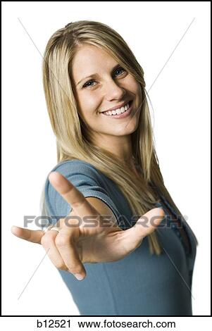 Stock Image - Woman making a hand gesture. Fotosearch