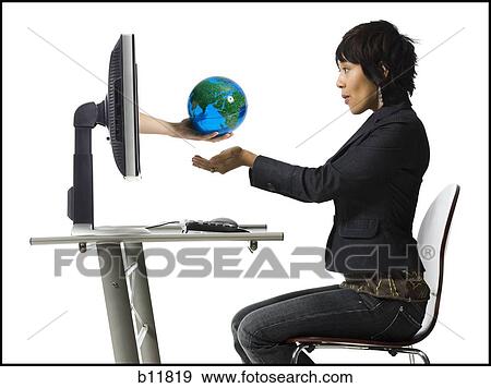 Woman receiving an earth globe online View Large Photo Image Stock Photo - Woman receiving an earth globe online. Fotosearch