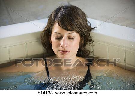 Woman relaxing in whirlpool View Large Photo Image Stock Photo - Woman relaxing in whirlpool. Fotosearch