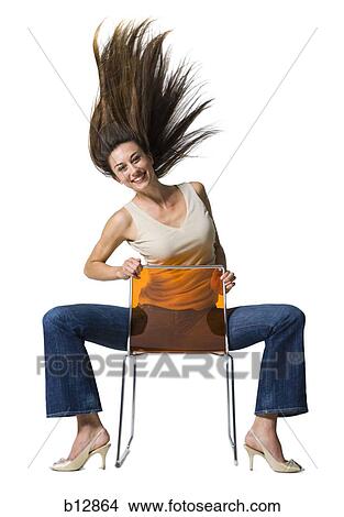 sitting on chair backwards