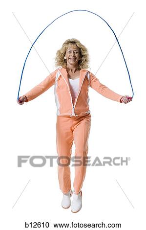 Woman skipping View Large Photo Image Stock Image - Woman skipping. Fotosearch