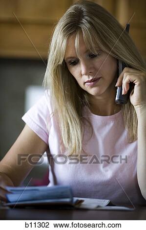 Woman speaking on phone View Large Photo Image Stock Image - Woman speaking on phone. Fotosearch