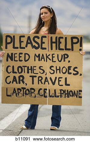 Woman standing on side of road soliciting View Large Photo Image Stock Image - Woman standing on side of road soliciting. Fotosearch