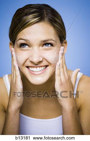 Woman washing face View Large Photo Image Stock Image - Woman washing face. Fotosearch