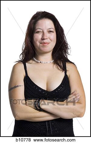 Stock Photo - Woman with arms folded. Fotosearch