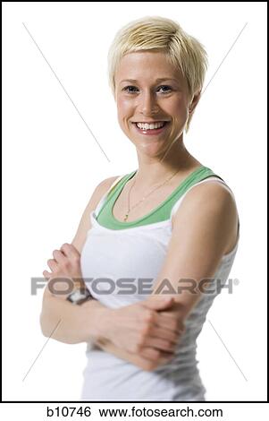 Woman with arms folded View Large Photo Image Stock Photograph - Woman with arms folded. Fotosearch