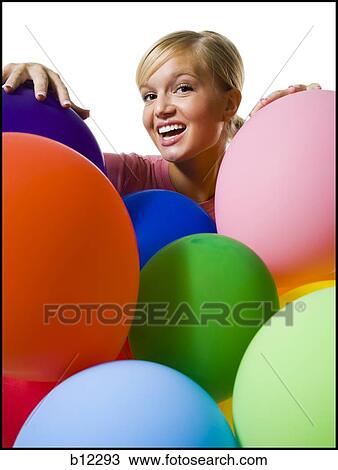 Stock Image - Woman with balloons. Fotosearch