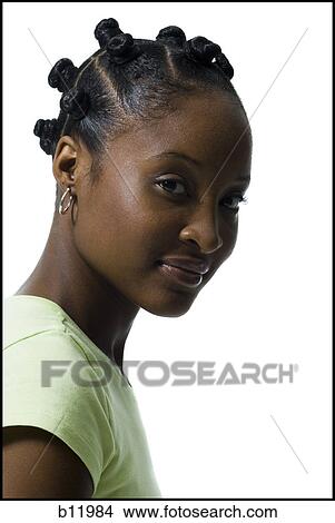 Picture - Woman with Bantu knots. Fotosearch