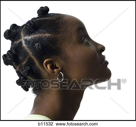 Stock Image - Woman with Bantu knots. Fotosearch