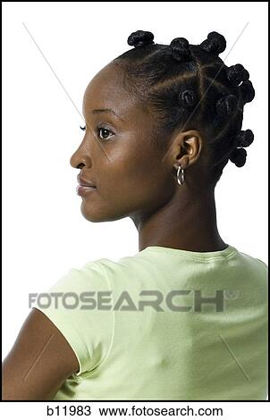 Stock Image - Woman with Bantu knots. Fotosearch