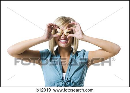 Stock Photo - Woman with fortune cookies. Fotosearch