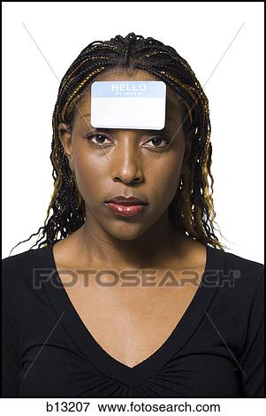 Woman with name tag on forehead View Large Photo Image Stock Photo - Woman with name tag on forehead. Fotosearch