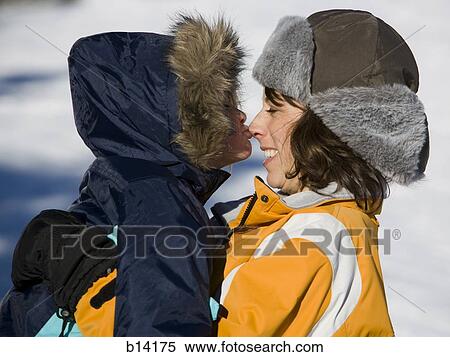 Woman with young girl outdoors in winter View Large Photo Image Stock Photography - Woman with young girl outdoors in winter. Fotosearch