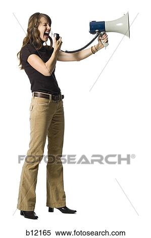 Woman yelling through megaphone View Large Photo Image Stock Photography - Woman yelling through megaphone. Fotosearch