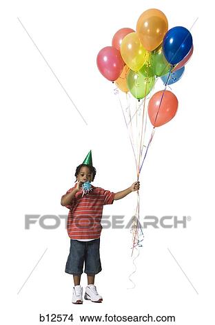 Young boy with balloons View Large Photo Image Picture - Young boy with balloons. Fotosearch