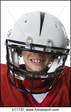 Stock Photo - Young football player. Fotosearch