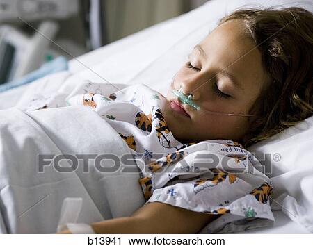 Young girl in hospital bed with respirator View Large Photo Image Stock Image - Young girl in hospital bed with respirator. Fotosearch