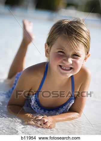Young girl in wading pool View Large Photo Image Picture - Young girl in wading pool. Fotosearch