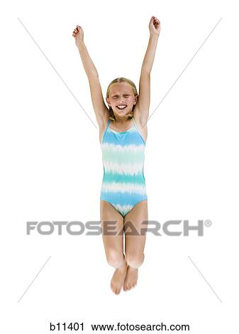 Stock Image - Young girl jumping. Fotosearch