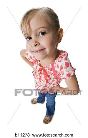 Young girl posing with hands on hips View Large Photo Image Stock Photo - Young girl posing with hands on hips. Fotosearch
