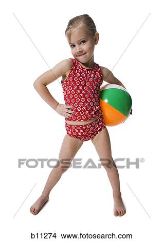 Young girl with beach ball View Large Photo Image Picture - Young girl with beach ball. Fotosearch