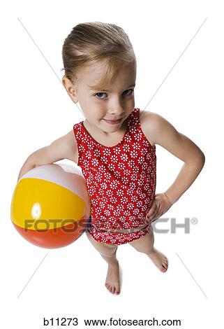 Young girl with beach ball View Large Photo Image Stock Image - Young girl with beach ball. Fotosearch