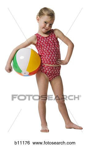 Young girl with beach ball View Large Photo Image Stock Photograph - Young girl with beach ball. Fotosearch