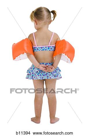 Young girl with personal flotation devices around arms View Large Photo Image Picture - Young girl with personal flotation devices around arms. Fotosearch