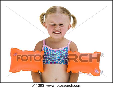 Young girl with personal flotation devices around arms View Large Photo Image Stock Image - Young girl with personal flotation devices around arms. Fotosearch