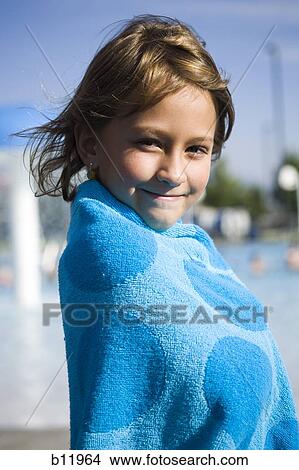 Picture - Young girl wrapped in a towel. Fotosearch