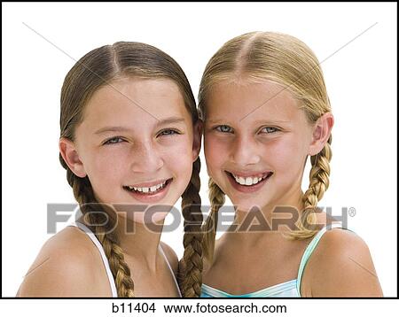 Young sisters in swimsuits on vacation View Large Photo Image Picture - Young sisters in swimsuits on vacation. Fotosearch
