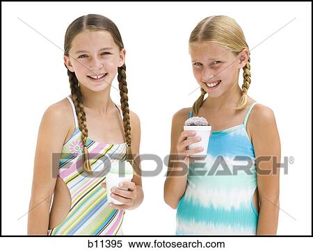 Young sisters in swimsuits on vacation View Large Photo Image Stock Photography - Young sisters in swimsuits on vacation. Fotosearch