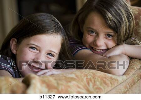 Young sisters View Large Photo Image Stock Photo - Young sisters. Fotosearch