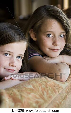 Stock Photograph - Young sisters. Fotosearch