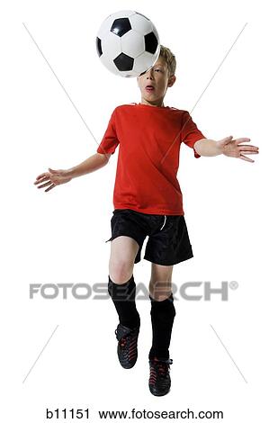 Stock Image - Young soccer player. Fotosearch