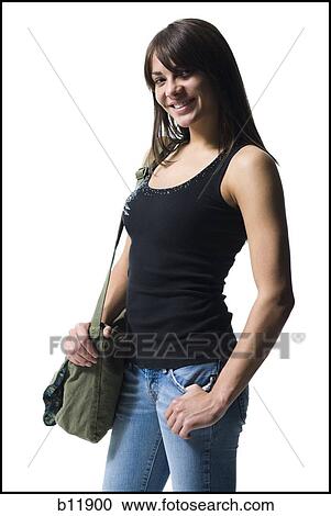 Young woman holding a bag View Large Photo Image Stock Image - Young woman holding a bag. Fotosearch