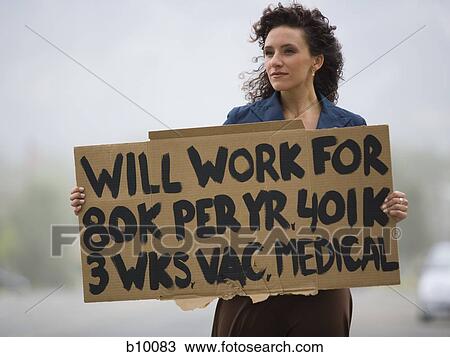 Young woman holding a work-wanted sign View Large Photo Image Stock Image - Young woman holding a work-wanted sign. Fotosearch
