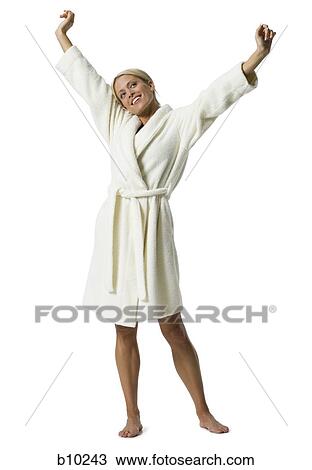 Young woman stretching her arms View Large Photo Image Stock Image - Young woman stretching her arms. Fotosearch