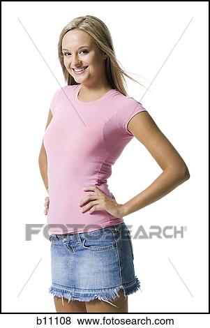 Young woman with hands on hips View Large Photo Image Stock Photo - Young woman with hands on hips. Fotosearch