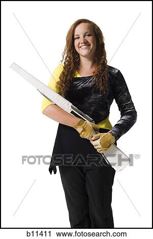 Stock Image - Young woman with red hair. Fotosearch