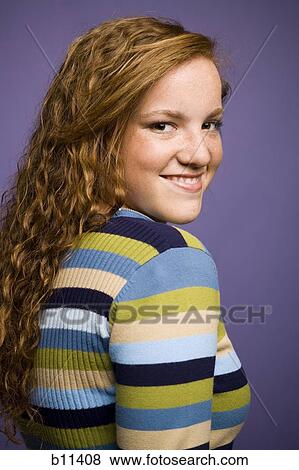 Young woman with red hair View Large Photo Image Stock Photo - Young woman with red hair. Fotosearch