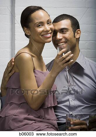 A couple at a party View Large Photo Image Stock Image - A couple at a party. Fotosearch
