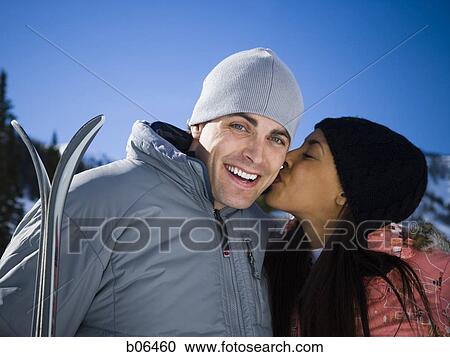 A couple outside in the snow View Large Photo Image Stock Image - A couple outside in the snow. Fotosearch