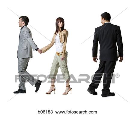 Stock Image - A woman looking at another man. Fotosearch