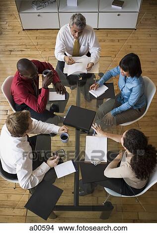 Aerial view of business meeting View Large Photo Image Picture - Aerial view of business meeting. Fotosearch