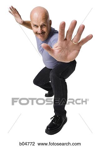 Bald man with moustache gesturing View Large Photo Image Stock Image - Bald man with moustache gesturing. Fotosearch