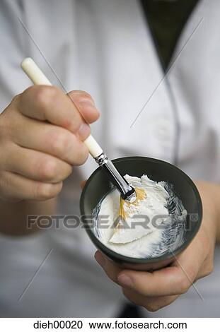 Beautician mixing cosmetic cream View Large Photo Image Stock Image - Beautician mixing cosmetic cream. Fotosearch
